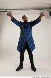 Garson STANDING POSE WITH GUNS 